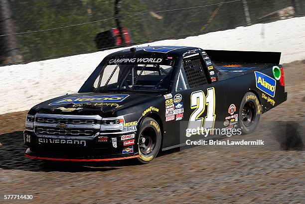 Johnny Sauter, driver of the Alamo Chevrolet, drives during practice for the 4th Annual Aspen Dental Eldora Dirt Derby at Eldora Speedway on July 19,...