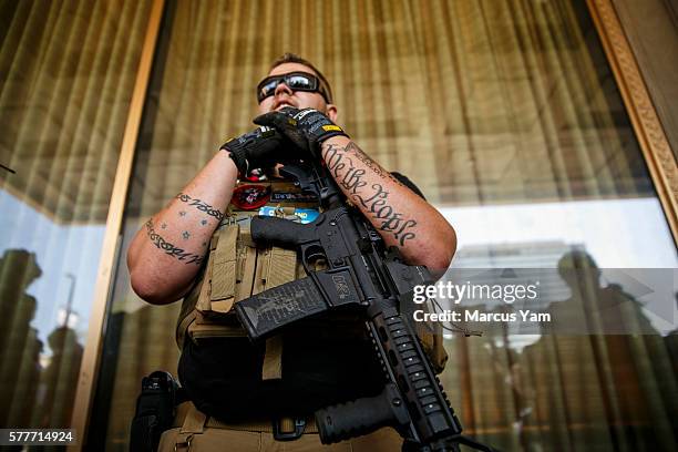 Trevor Leis from Lima, Ohio, of the West Ohio Minutemen group stand guard outside the 2016 Republican National Convention in Cleveland, Ohio, on July...