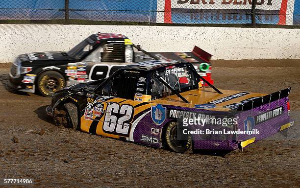 Donnie Levister, driver of the Property Pro's Toyota, wrecks during practice for the 4th Annual Aspen Dental Eldora Dirt Derby at Eldora Speedway on...