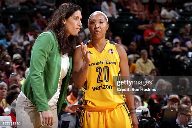 Stephanie White of the Indiana Fever talks with Briann January of the Indiana Fever during the game against the Los Angeles Sparks during a WNBA game...