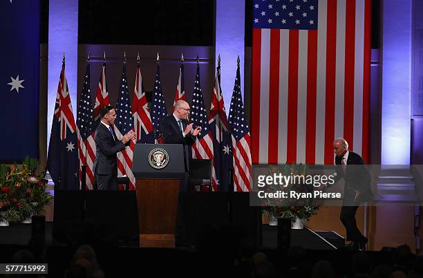 Vice-President Joe Biden trips on a step as he arrives to deliver a speech on the future of the U.S.-Australia relationship at Paddington Town Hall...