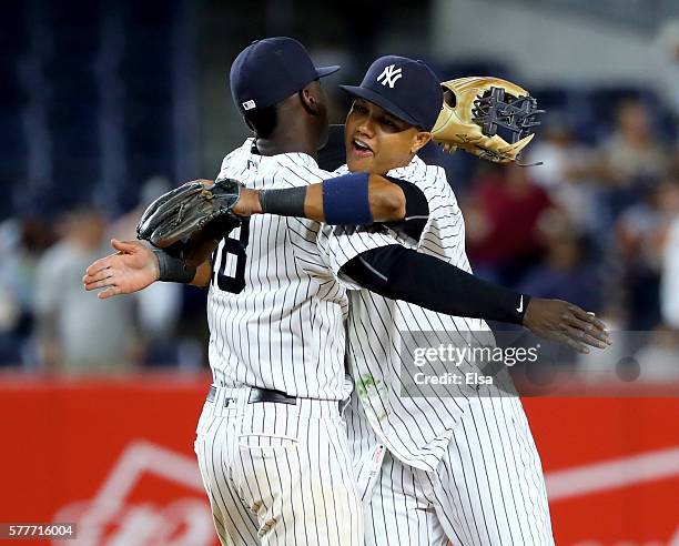 Didi Gregorius and Starlin Castro of the New York Yankees celebrate the 7-1 win over the Baltimore Orioles on July 19, 2016 at Yankee Stadium in the...