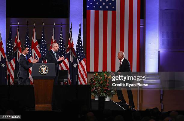 Vice-President Joe Biden trips on a step as he arrives to deliver a speech on the future of the U.S.-Australia relationship at Paddington Town Hall...