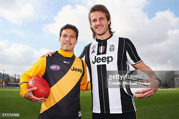Ivan Maric of the Tigers, a soccer fanatic, gets to meet Hernanes of Juventus during a Richmond Tigers AFL and Juventus FC media opportunity at Punt...