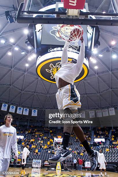 Wichita State Shockers Tekele Cotton practices dunking prior to the NCAA Missouri Valley Confrence basketball game between the Missouri State Bears...