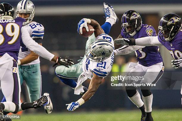 Dallas Cowboys running back Joseph Randle gets upended during the NFL preseason football game between the Baltimore Ravens and the Dallas Cowboys at...