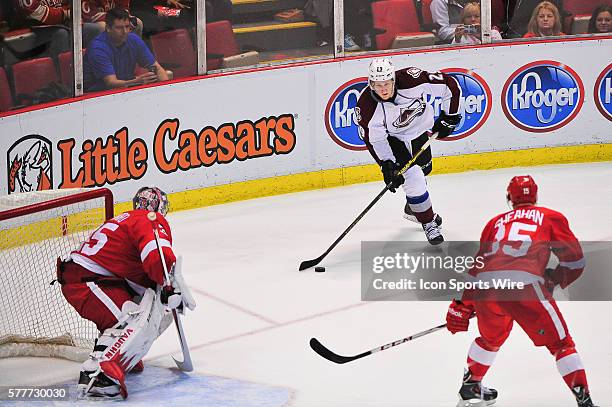 March 6, 2014 - Detroit, MI Colorado Avalanche center Nathan MacKinnon makes a cross ice pass to set up the game winning goal by Colorado Avalanche...