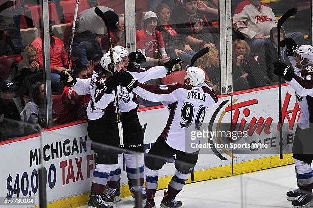 March 6, 2014 - Detroit, MI Colorado Avalanche defenseman Andre Benoit celebrates his game winning goal with his line mates during the overtime...