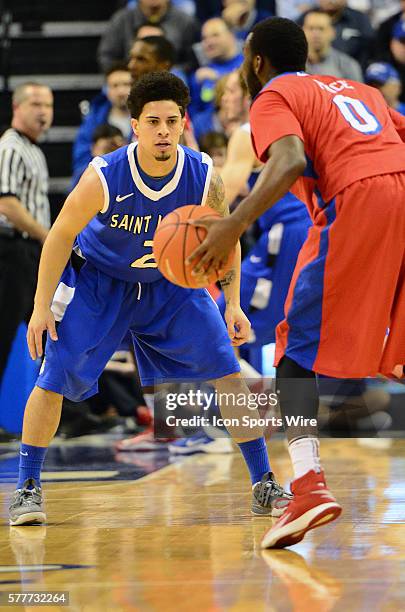 Saint Louis University guard Austin McBroom guards Dayton Flyers guard Khari Price during an Atlantic 10 Conference basketball game between the...