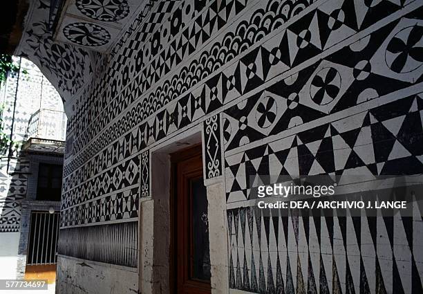 House with traditional decoration , Pyrgi, Chios island, Greece.