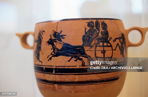 Cabirus skyphos with a procession scene, representing a cart being pulled by donkeys, Greece. Greek civilisation, 5th-4th century BC. Athens, Ethnikó...