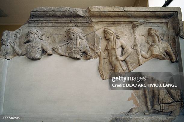 Relief depicting the gods Hermes, Athena, Apollo and Artemis from left to right, found in Piraeus, Greece. Greek civilisation, 2nd century BC. IL...