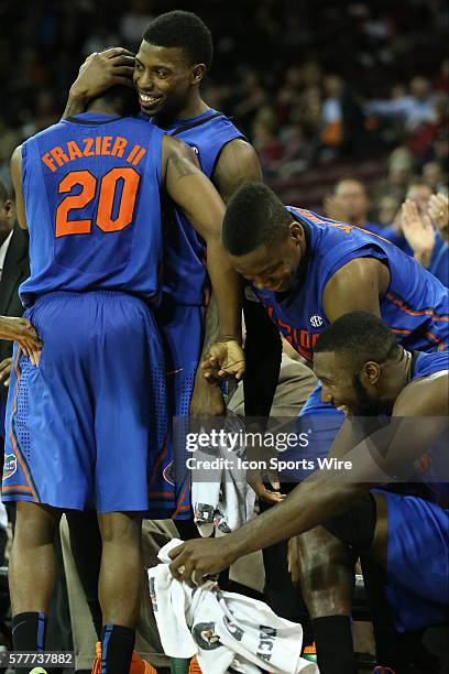 The Florida Gators bench reacts as Florida Gators guard Michael Frazier II comes off the floor after setting a three point record for Florida and the...