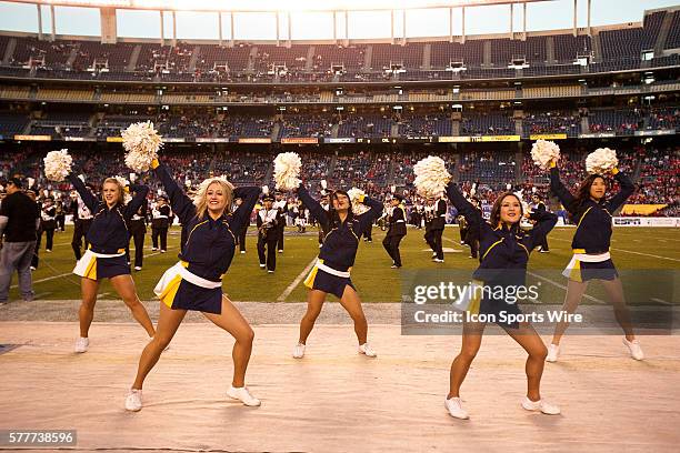 Cal cheerleaders dance during the opening ceremonies prior to a game against Utah in the San Diego County Credit Union Poinsettia Bowl at Qualcomm...