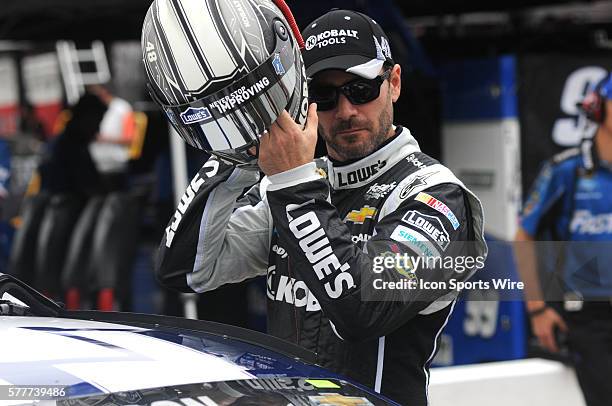 Jimmie Johnson Hendrick Motorsports Lowe's Chevrolet SS preparing to climb in his car before practice for the Irwin Tools Night Race at Bristol Motor...