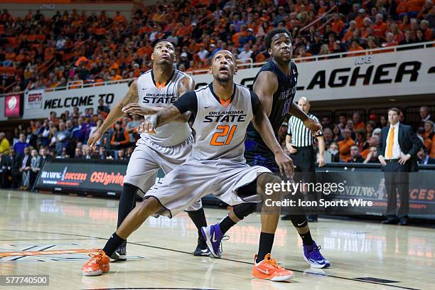 Oklahoma State Cowboys forward/center Kamari Murphy and Oklahoma State Cowboys guard Marcus Smart during the NCAA basketball Big 12 Confrence game...