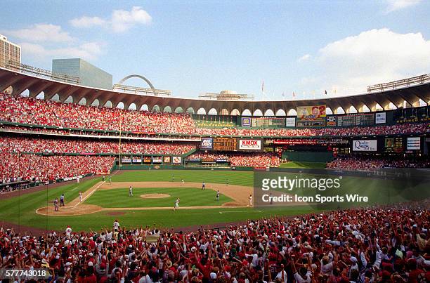 Mark McGwire of the St. Louis Cardinals rounding the bases after hitting his 70th homerun on Sept. 27th 1998 at Busch Stadium in St. Louis, Missouri.