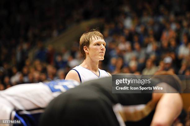 Duke forward Kyle Singler looks at the goal while at the free throw line during a game between the Wake Forest Demon Deacons and the Duke Blue Devils...