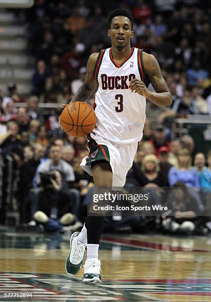 Milwaukee Bucks guard Brandon Jennings bring the basketball up court against the Indiana Pacers in the second quarter of a NBA game at the Bradley...