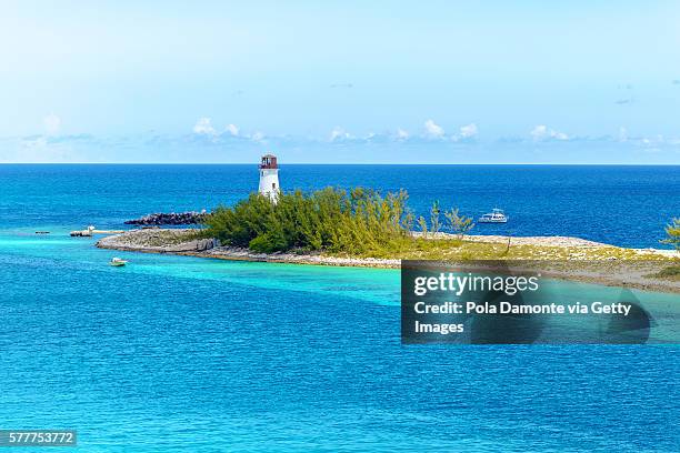 nassau lighthouse at the bahamas in the caribbean. - atlantis stock pictures, royalty-free photos & images