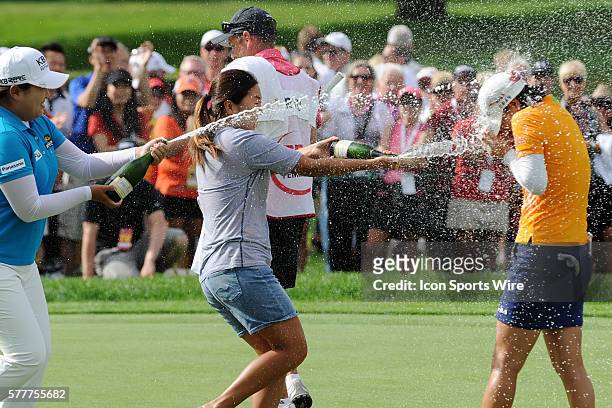 So Yeon Ryu receives a champagne shower on the 18th green in action during the Final round of the LPGA Canadian Pacific Women's Open at the London...