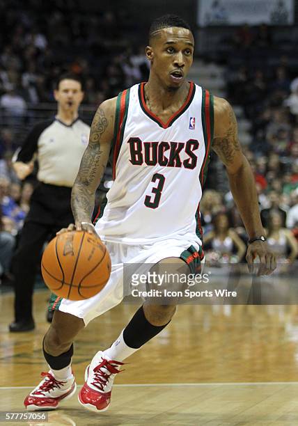 Milwaukee Bucks guard Brandon Jennings brings the basketball up court against the Charlotte Bobcats in the first quarter of a NBA game at the Bradley...