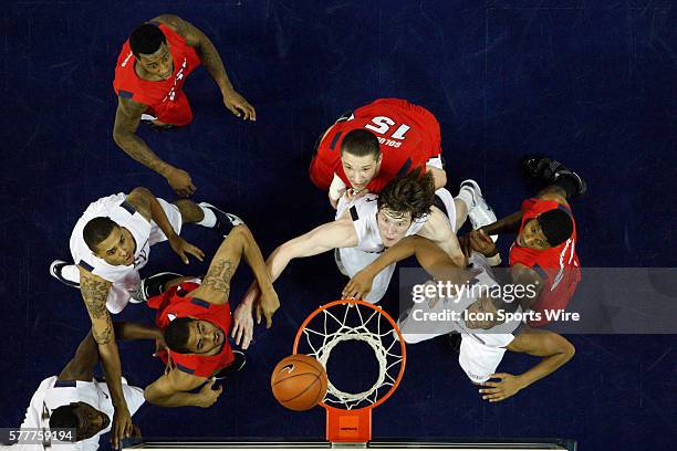 Nevada's Brandon Fields , Luke Babbitt , Dario Hunt and Joey Shaw with Fresno State's Jerry Brown Jr. , Nedeljko Golubovic and Paul George during the...