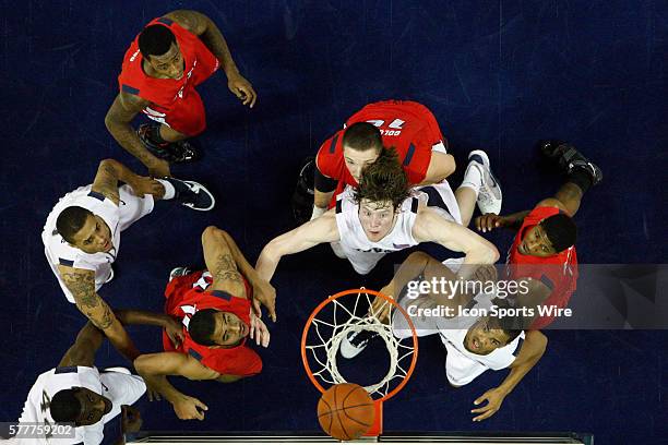 Nevada's Brandon Fields , Luke Babbitt , Dario Hunt and Joey Shaw with Fresno State's Jerry Brown Jr. , Nedeljko Golubovic and Paul George during the...