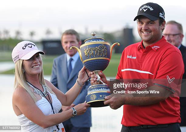March 09 Patrick Reed and wife Justine hold the Trophy after winning the PGA - World Golf Championship - Final Round at Trump National Doral in...