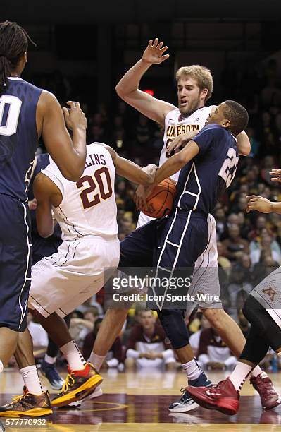 March 9 Nittany Lions guard Tim Frazier drives the lane against Minnesota guard Austin Hollins and center Elliott Eliason during the first half at...
