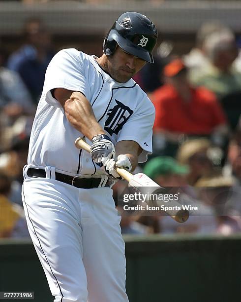 Johnny Damon of the Tigers stretches in the on deck circle as the Detroit Tigers face the visiting Baltimore Orioles in Grapefruit League action...