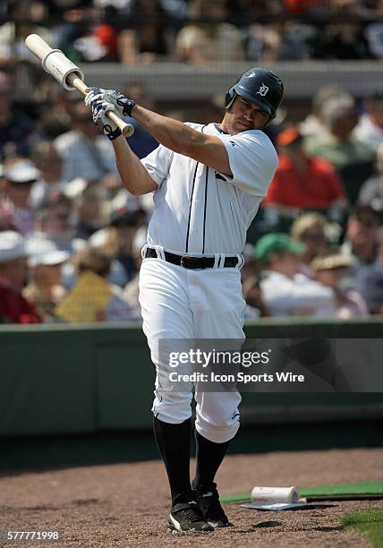 Johnny Damon of the Tigers stretches in the on deck circle as the Detroit Tigers face the visiting Baltimore Orioles in Grapefruit League action...