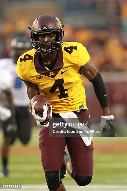 August 28, 2014 Gophers wide receiver Donovahn Jones scores a touchdown during the second quarter at the Minnesota Gophers game versus Eastern...