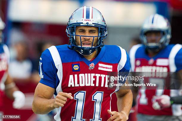 Montreal Alouettes linebacker Chip Cox runs on the field prior to the game between the Montreal Alouettes and the Ottawa RedBlacks at the Percival...