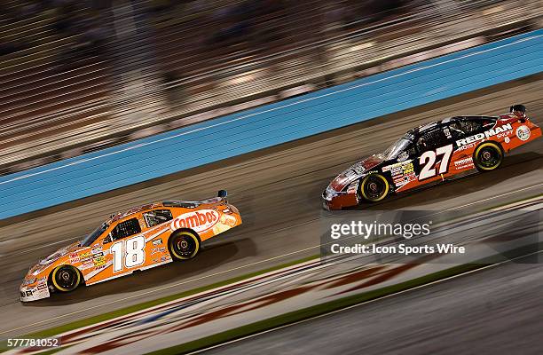 Apr 09: Kyle Busch leads Greg Biffle during the running of the Bashas Supermarkets 200 race at the Phoenix International Raceway in Avondale, AZ on...