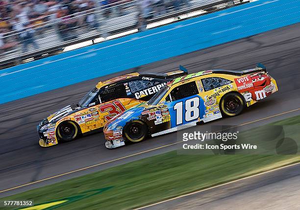 Apr 10: Kyle Busch and Jeff Burton race side by side during the running of the Subway Fresh Fit 600 race at the Phoenix International Raceway in...