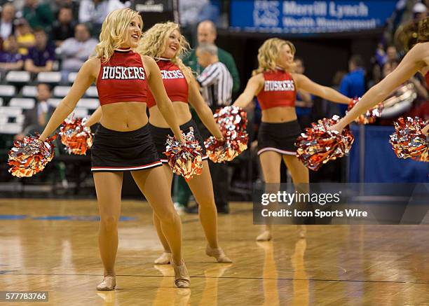 Nebraska Cornhuskers Cheerleaders between the Nebraska Cornhuskers and the Ohio State Buckeyes at the Bankers Life Fieldhouse in Indianapolis, IN.