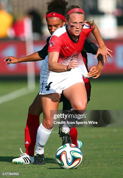 Kim Sharo of Louisville loses the ball to Allie Stone of Ole Miss during an NCAA soccer match at Lynn Stadium, in Louisville, Kentucky. Louisville...