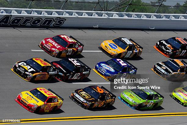 Kevin Harvick Richard Childress Racing Chevrolet Impala SS and Jeff Burton Richard Childress Racing Chevrolet Impala SS lead a big pack of race cars...