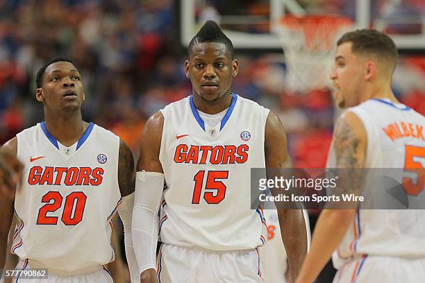 Florida Gators guard Michael Frazier II \15#2\ and guard Scottie Wilbekin walk back to the bench in first half action of the Tennessee Volunteers v...