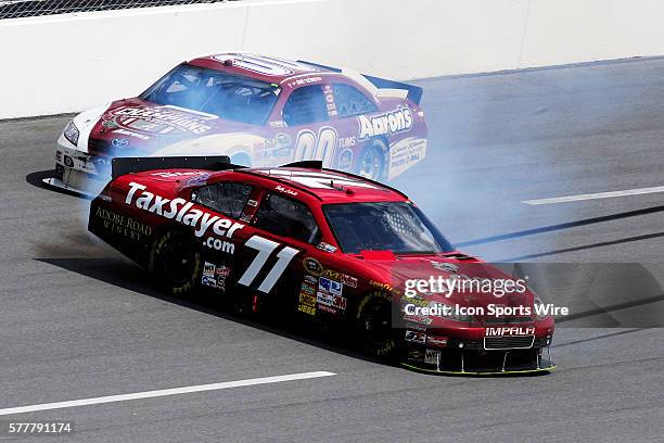 Bobby Labonte TRG Motorsports Chevrolet Impala SS goes spinning in turn two after getting a tap in the rear from David Reutimann Michael Waltrip...