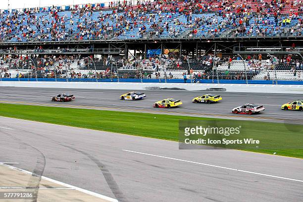 Kevin Harvick leads Clint Bowyer and Jamie McMurray during the Aaron's 312 at the Talladega Superspeedway in Talladega, AL.
