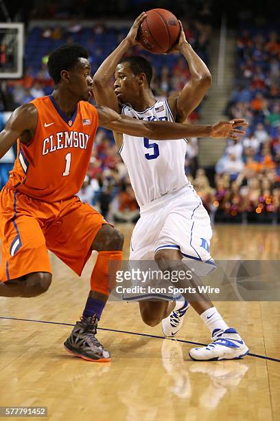 Duke Blue Devils forward Rodney Hood fakes out Clemson Tigers guard/forward Austin Ajukwa during the ACC Mens Basketball Tournament Championship at...