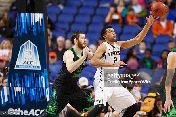 Wake Forest Demon Deacons forward Devin Thomas collects the ball in the post against Notre Dame Fighting Irish center Garrick Sherman during the ACC...