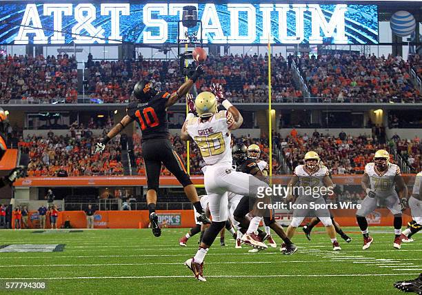 Florida State Seminoles linebacker E.J. Levenberry tips the ball in front of Florida State Seminoles wide receiver Rashad Greene during the football...