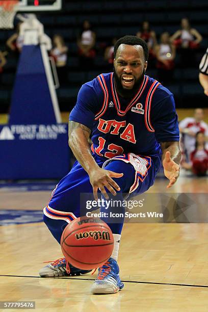 Texas-Arlington Mavericks guard Shaquille White-Miller loses control of the ball during the ULL v UT Arlington Men's Semifinal basketball game at UNO...