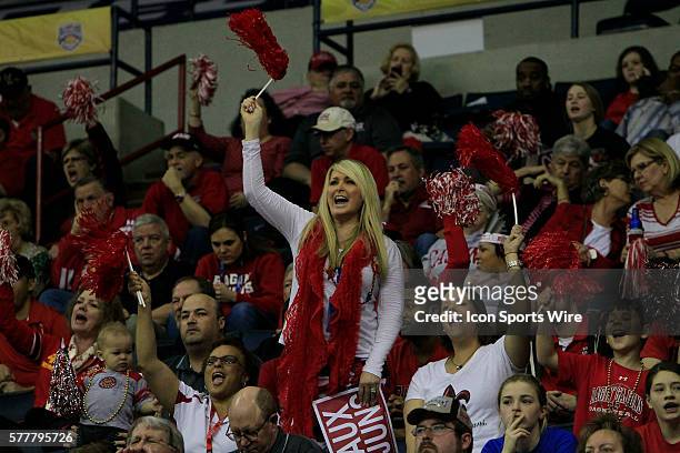Ragin' Cajun fan cheers her team during the WKU v University of Louisiana Lafayette Men's Semifinal basketball game at UNO Lakefront Arena, New...