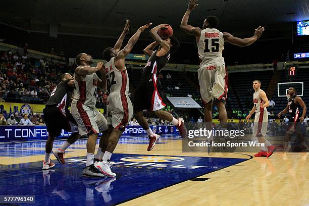 Louisiana Lafayette Ragin' Cajuns guard Elfrid Payton moves through heavy traffic to make the shot during the WKU v University of Louisiana Lafayette...