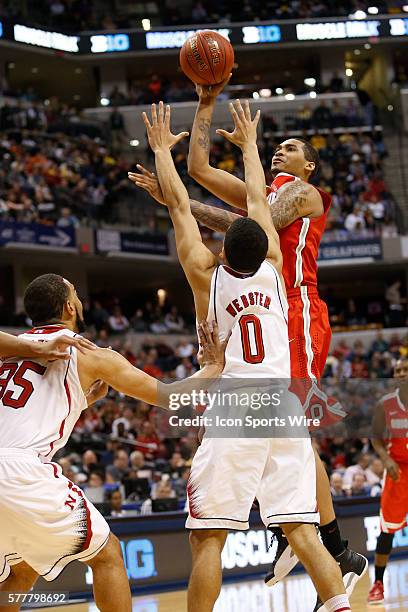 Ohio State forward LaQuinton Ross with the jump shot over Nebraska guard Tai Webster during the basketball game between the Nebraska Cornhuskers vs...