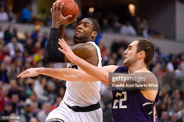 Michigan State Spartans guard/forward Branden Dawson battles with Northwestern Wildcats center Alex Olah during the Big Ten Men's Basketball...